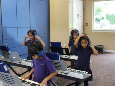 EEAE students using pianos image