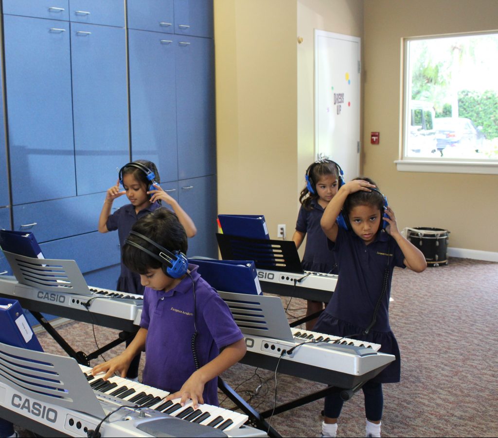 EEAE students using pianos image